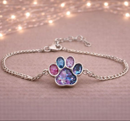 pretty pawprint memorial bracelt with pet ashes inside mixed with crushed opals.